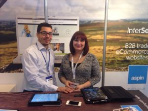 Jacqui from Creative Tops with Doug at the Aspin stand.